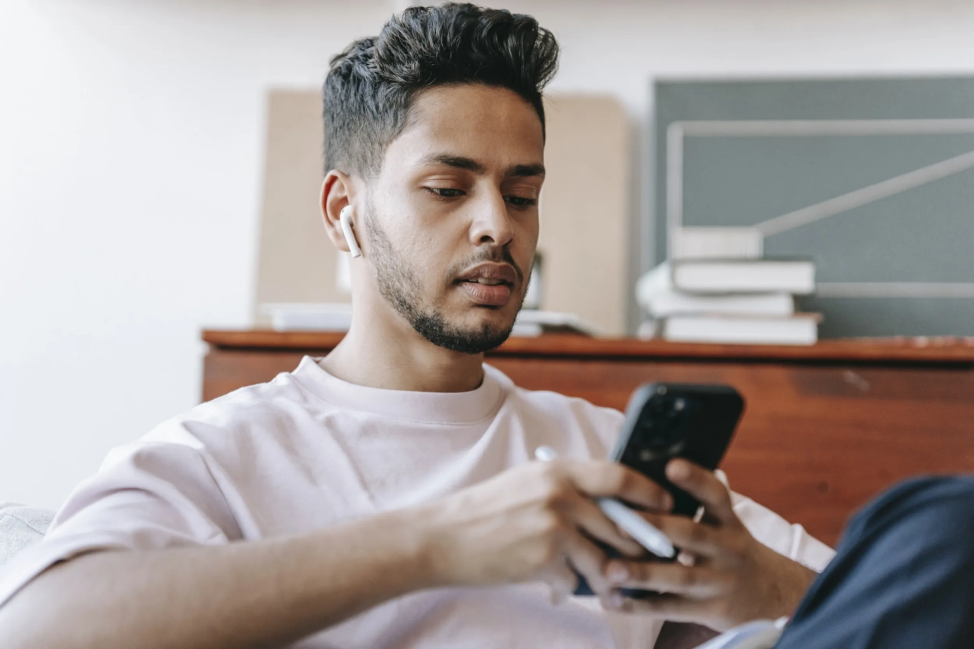 man looking at his phone